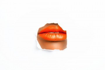 woman with orange lipstick